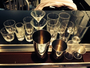 Various bar glassware and shakers