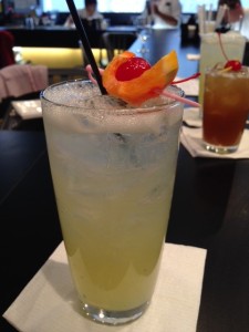 Tom Collins - 1.5 oz gin filled with sour, shaken, finished with a 7-up float and garnished with a flag